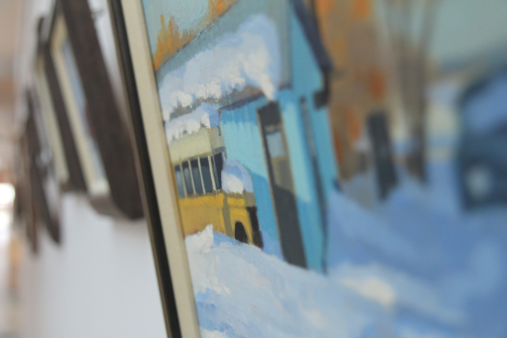 A painting of a winter scene hanging at CWB National Leasing head office