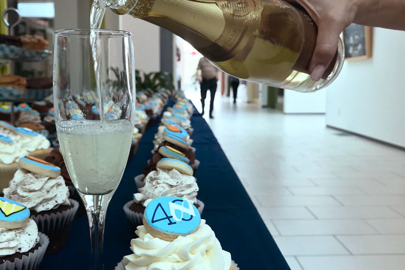 CWB National Leasing employees celebrate the company’s 40th birthday with a 300-person champagne toast