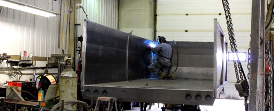A photo of SWS Truck Bodies & Trailers’s staff building a custom trailer