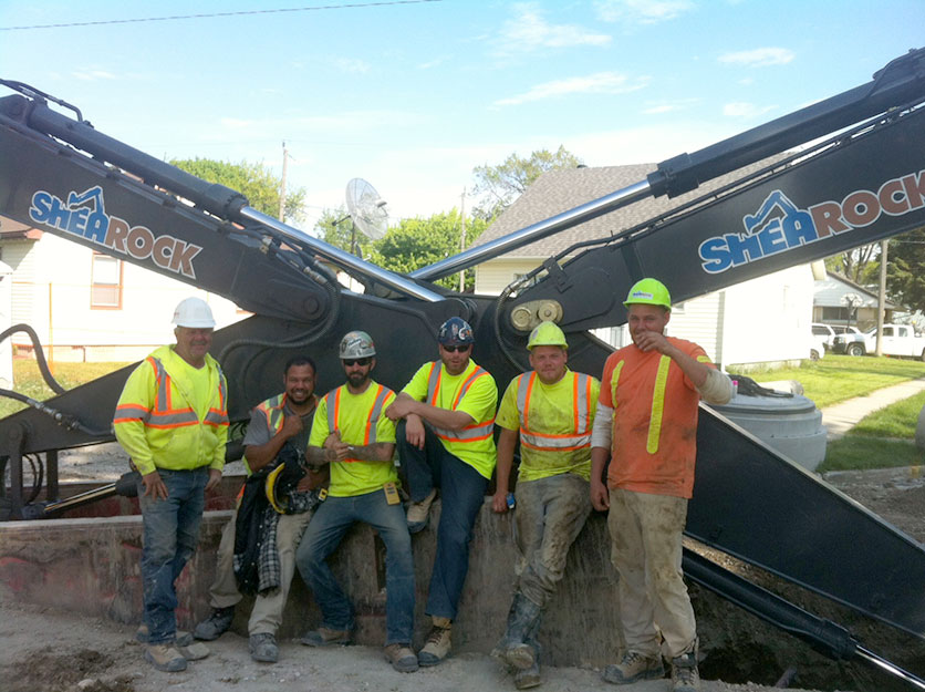 A photo showing members of the SheaRock Construction Group team