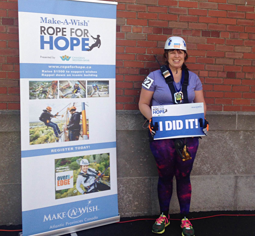 Erica Pollock, CWB National Leasing Account Manager, after her rappel in Halifax