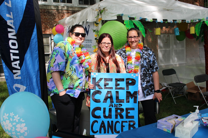 Autumn Furlong (left) volunteering with co-workers at Challenge for Life, June 2016