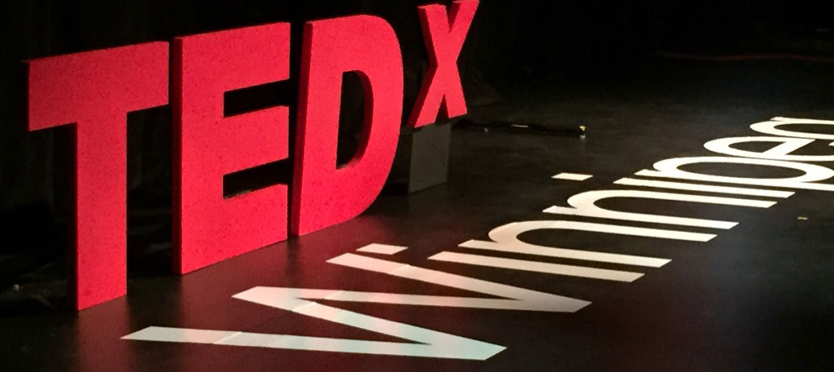 The TedX logo sits atop text that reads Winnipeg on the TedX Winnipeg stage. Read the blog post for the event's 6 best takeaways.