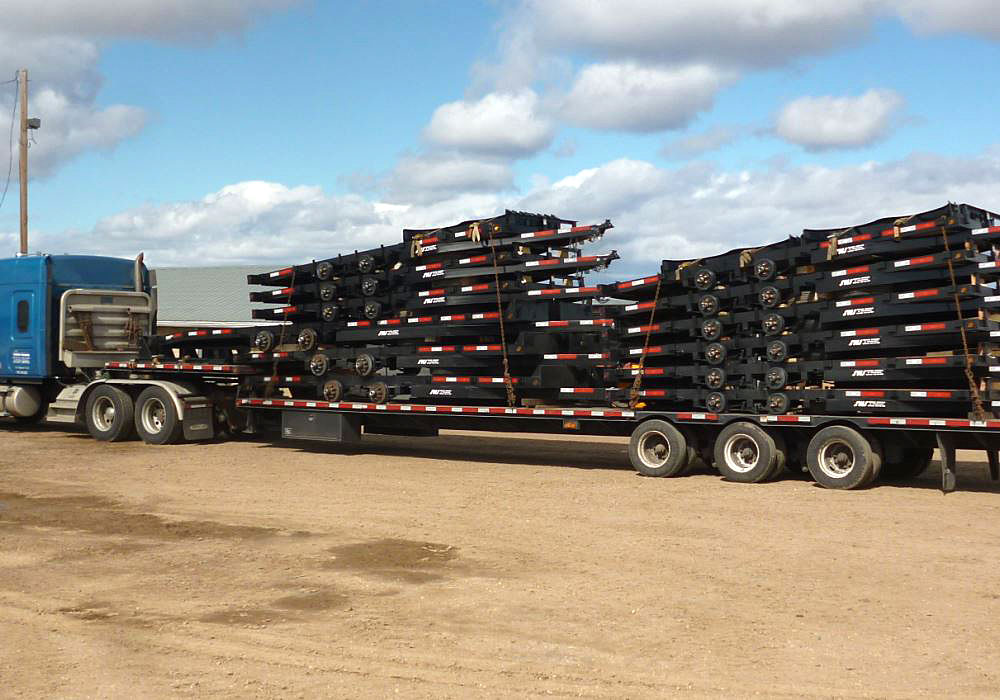 SWS Truck Bodies & Trailers lot filled with trailers